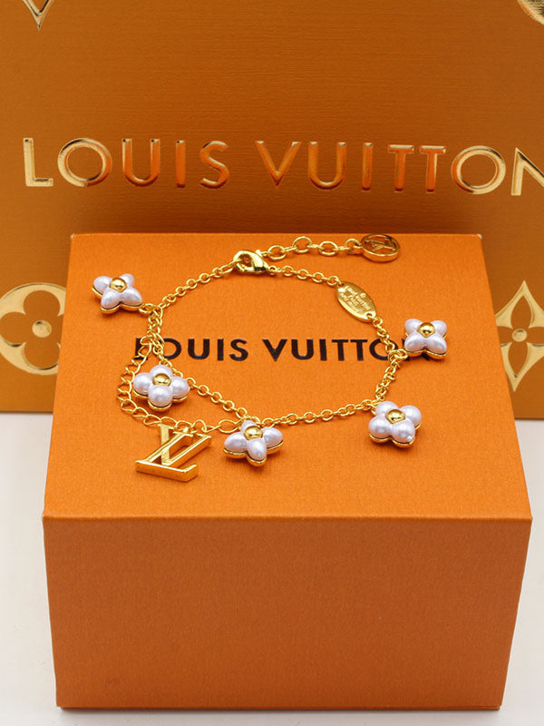 اساور لويس فيتون وايت فلاورز لوقو اسواره louis vuitton ذهبي