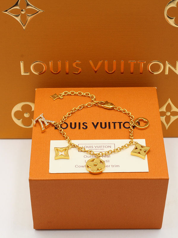 اساور لويس فيتون هيفي بنتدنتس لوقو اسواره louis vuitton ذهبي