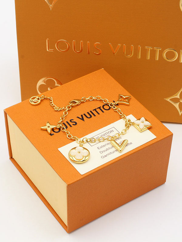 اساور لويس فيتون مكس بندنتس لوقو وايت اسواره louis vuitton ذهبي
