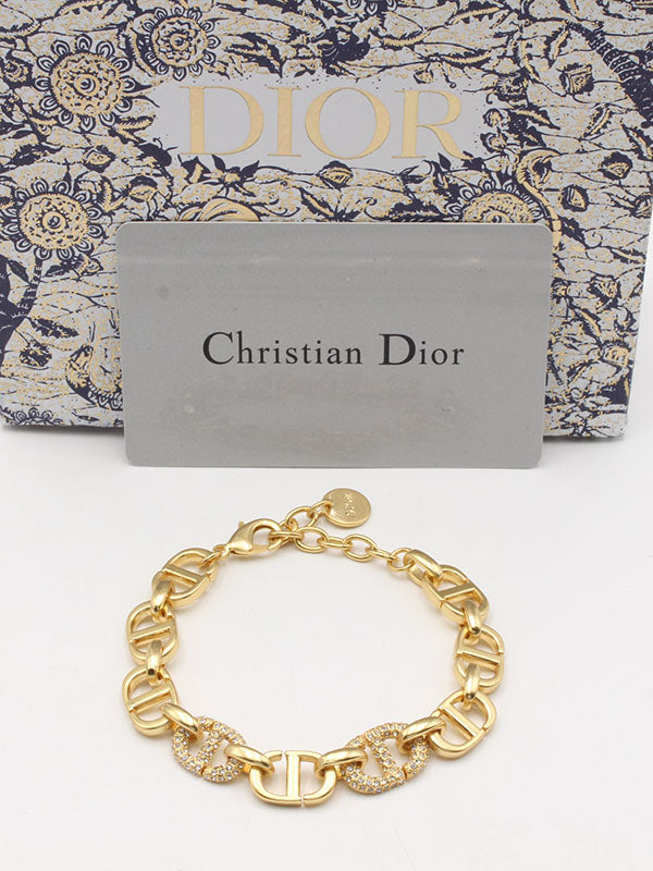 اساور ديور لوقو جنزير مطفي اسواره dior ذهبي