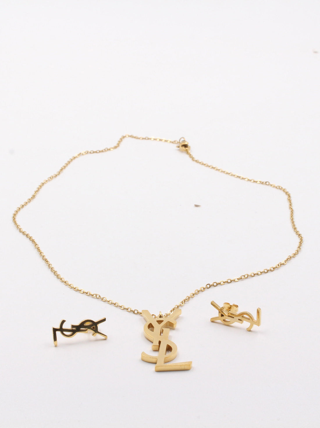 طقم ايف سان لوران قولد لوقو اطقم ysl