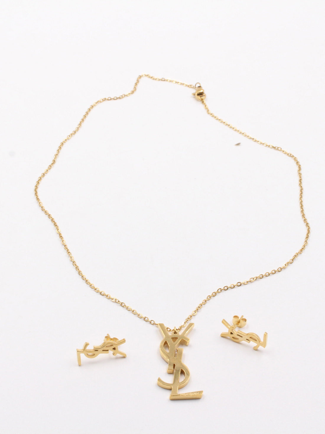 طقم ايف سان لوران قولد لوقو اطقم ysl ذهبي
