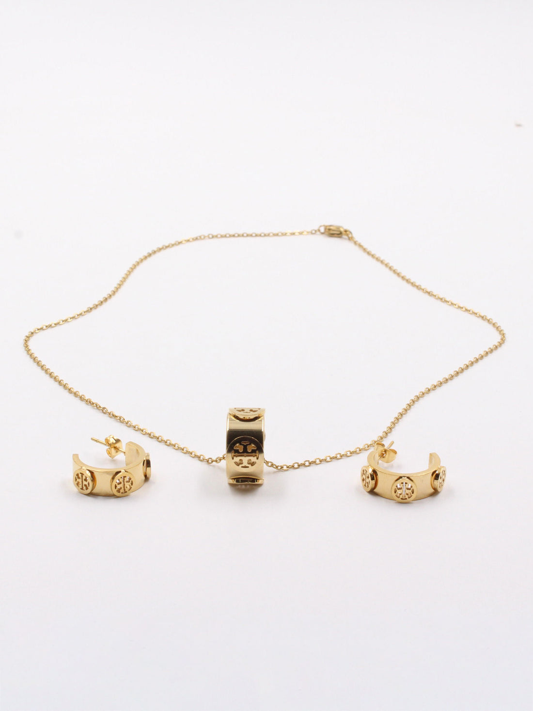 طقم توري بورش ذهبي لوقو اطقم tory burch