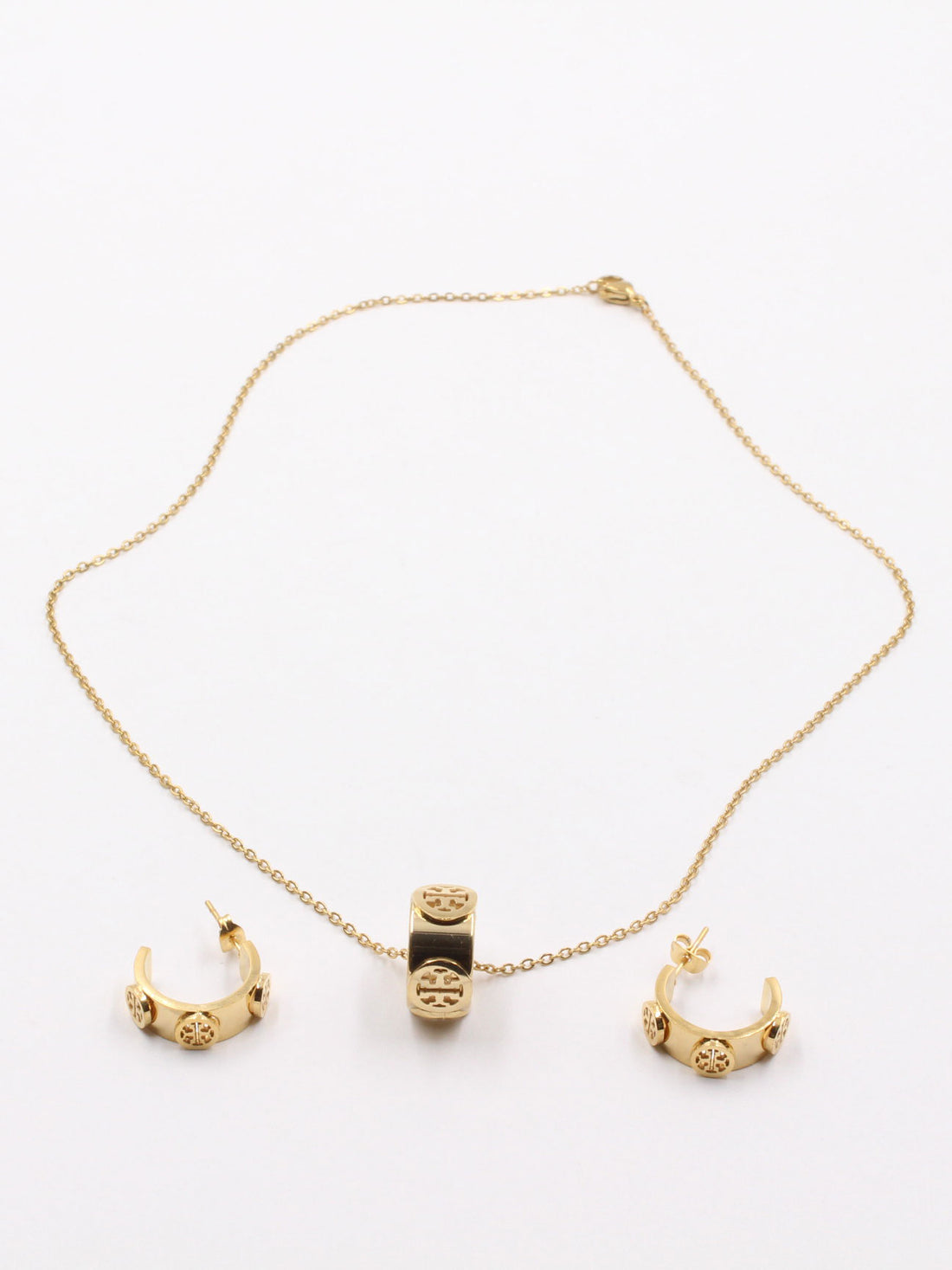 طقم توري بورش ذهبي لوقو اطقم tory burch ذهبي