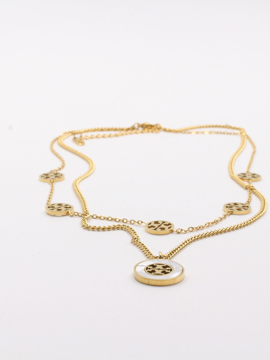 سلسال توري بورش دبل شاين شيل سلسال tory burch ذهبي ابيض