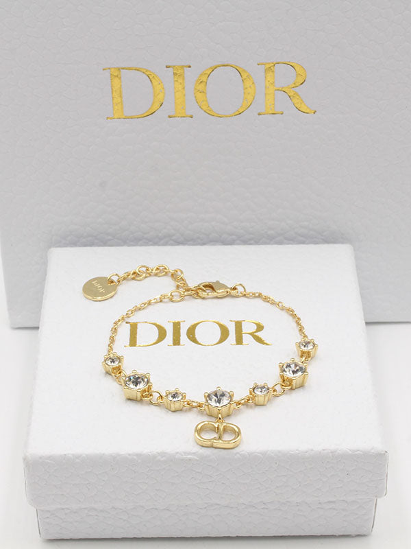 اساور ديور ستونز نيو لوقو اسواره dior ذهبي