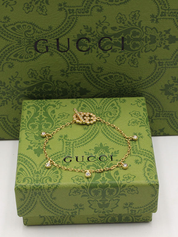 اساور قوتشي سمبل شاين زركون لوقو اسواره gucci ذهبي