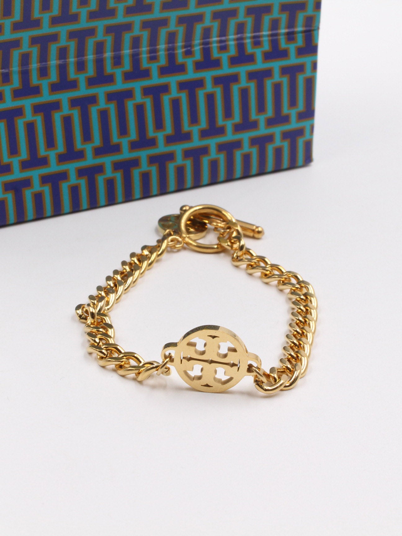 اسوارة توري بورش سيركل لوقو اسواره tory burch ذهبي