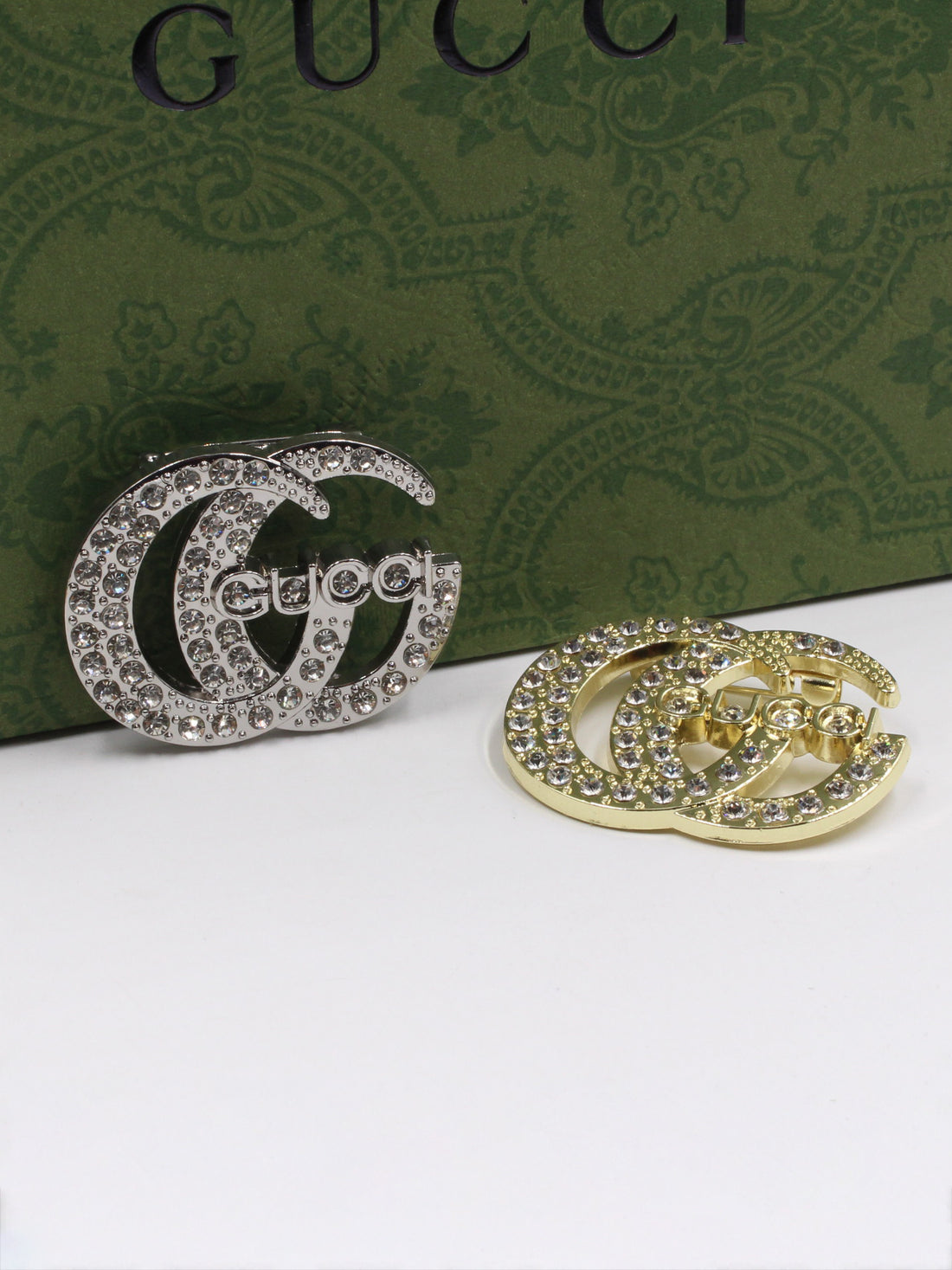 بروش قوتشي كريستال لوقو بروش gucci