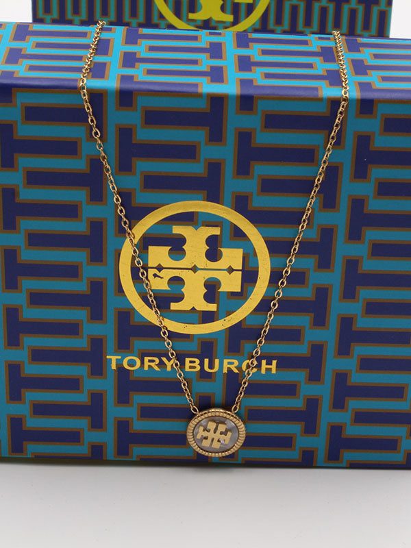سلسال توري بورش مدور شيل سلسال tory burch ذهبي