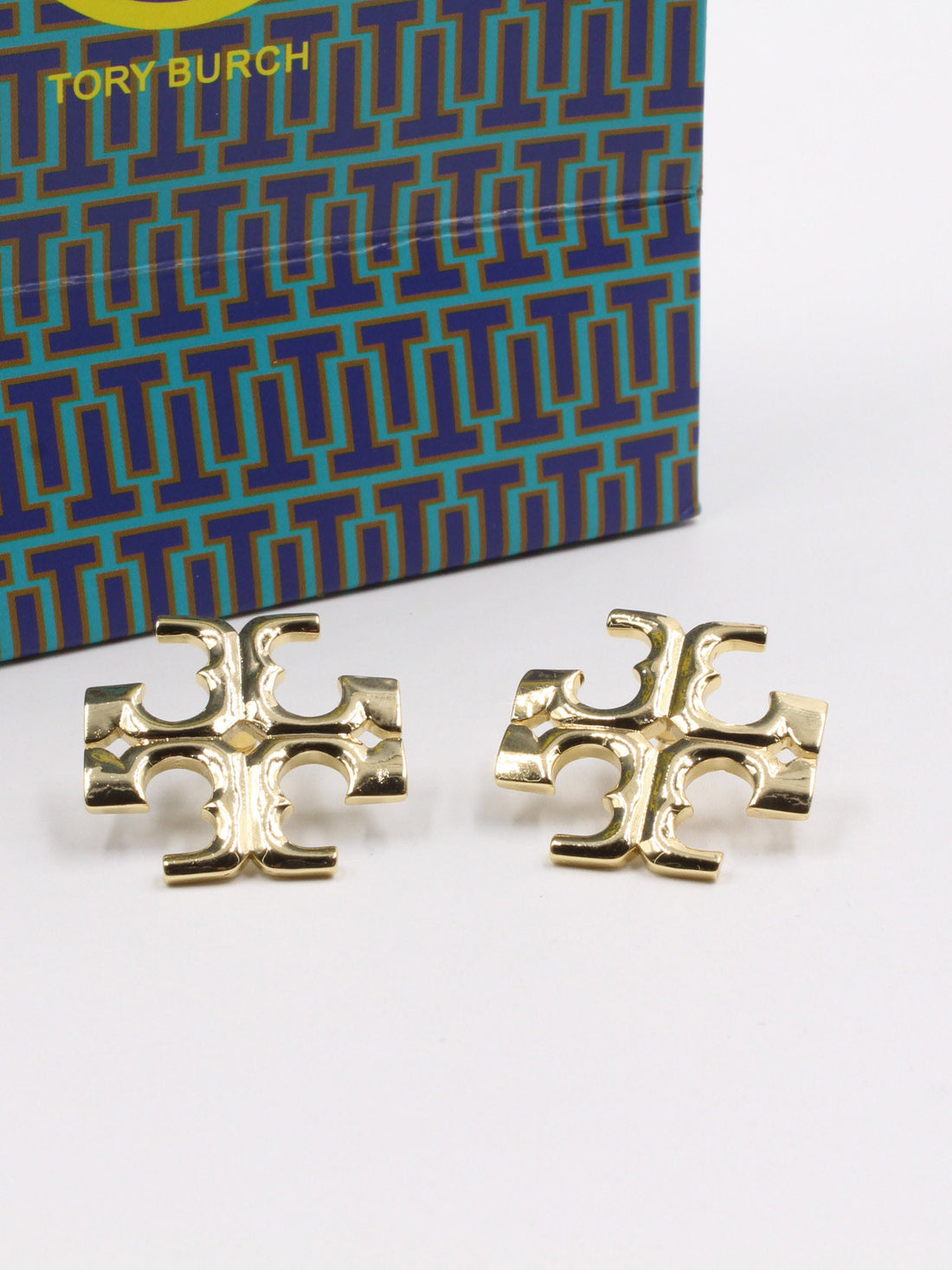 حلق توري بورش لوقو كبير حلق tory burch ذهبي