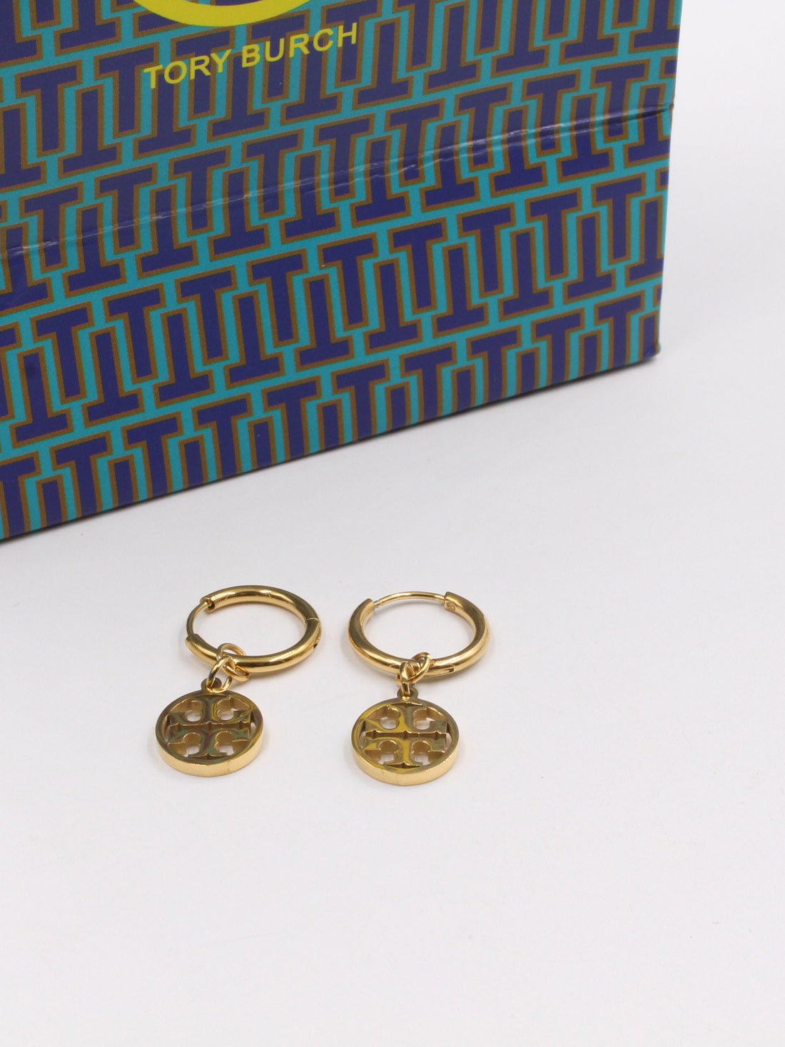 حلق توري بورش لوقو كبس حلق tory burch ذهبي