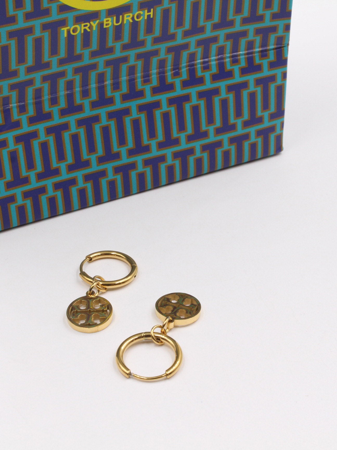 حلق توري بورش لوقو كبس حلق tory burch