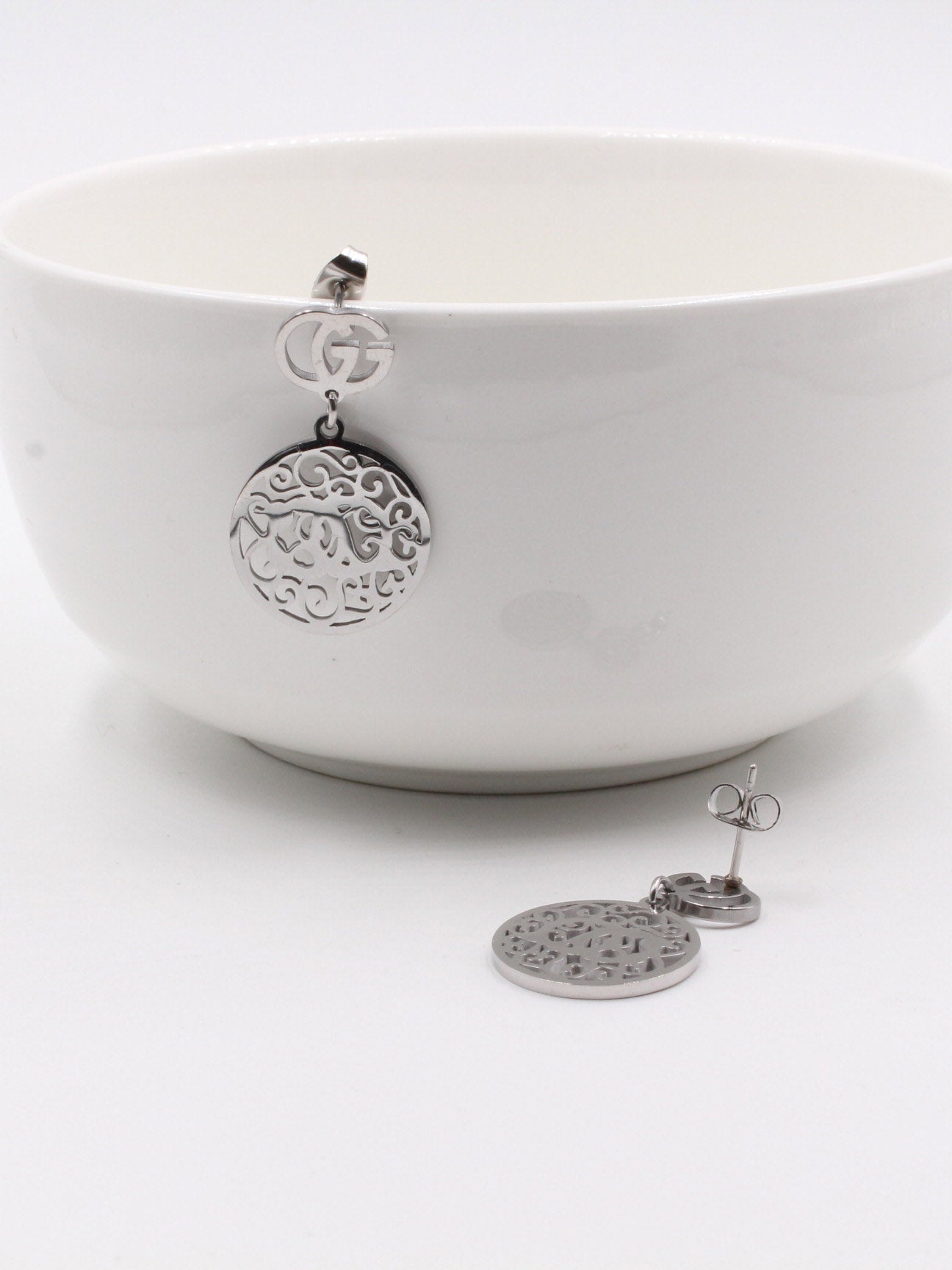 حلق قوتشي مزخرف حلق gucci فضي