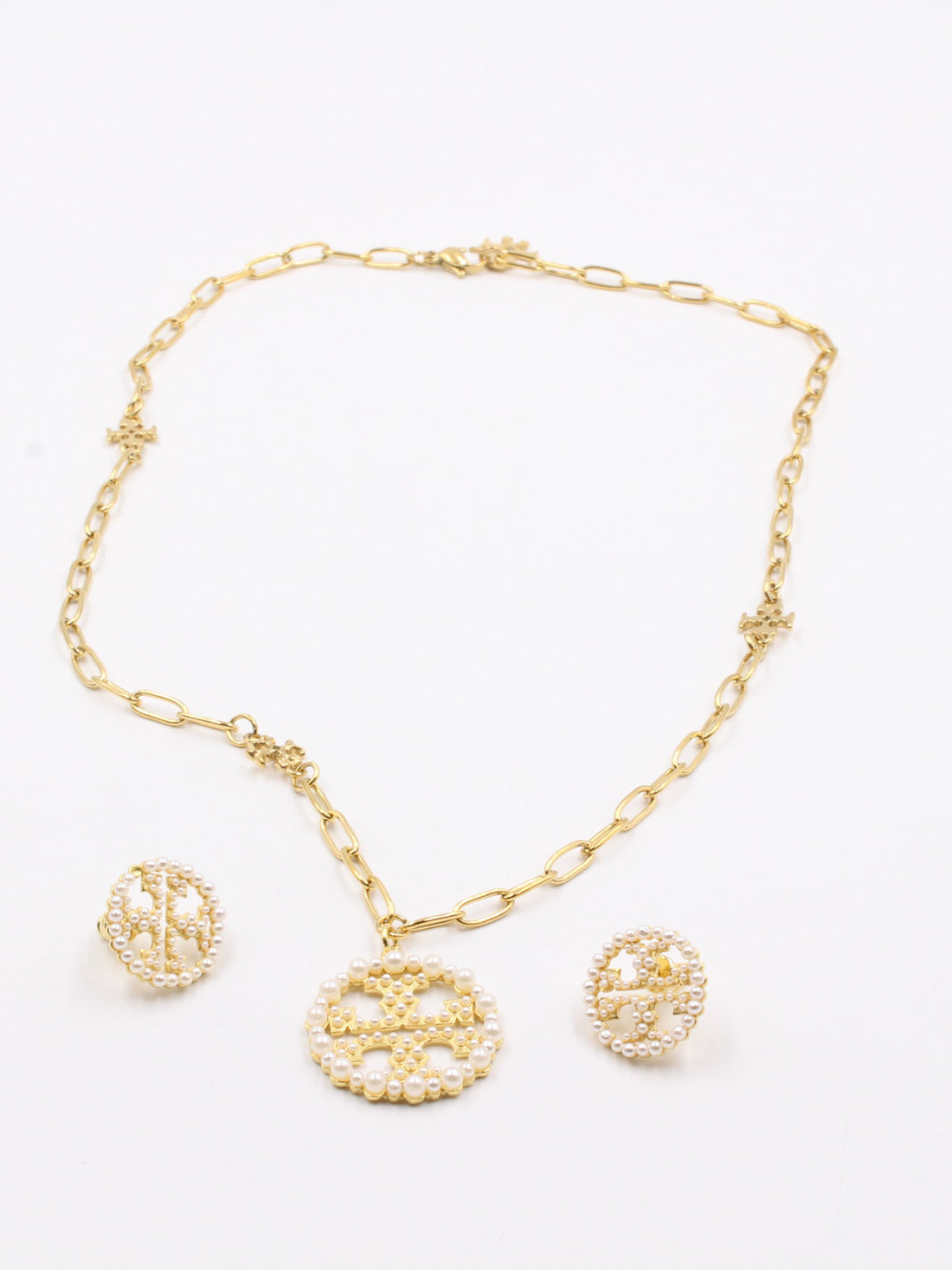 طقم توري بورش لولو ذهبي اطقم tory burch ذهبي