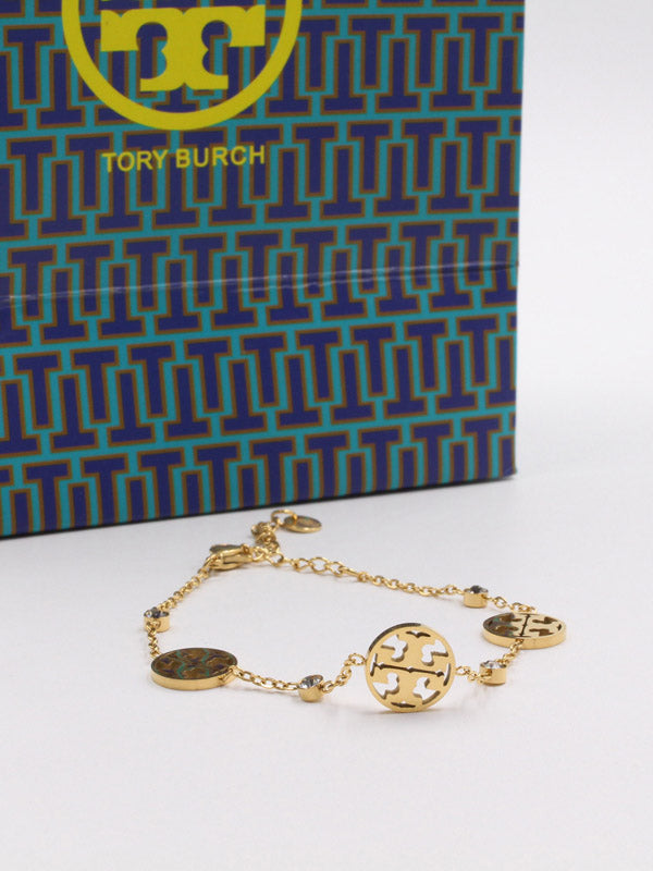 اسواره توري بورش ناعمه كرستال اسواره tory burch ذهبي