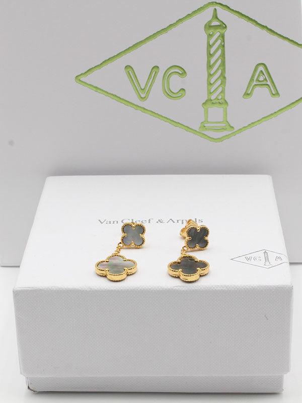 فان كليف حلق وردتين صدف طبيعي حلق van cleef