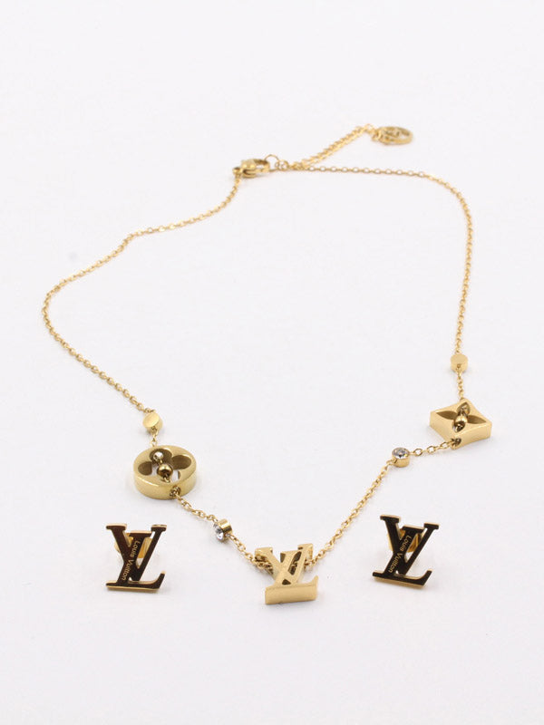 طقم لويس فيتون قولد لوقو اطقم louis vuitton ذهبي