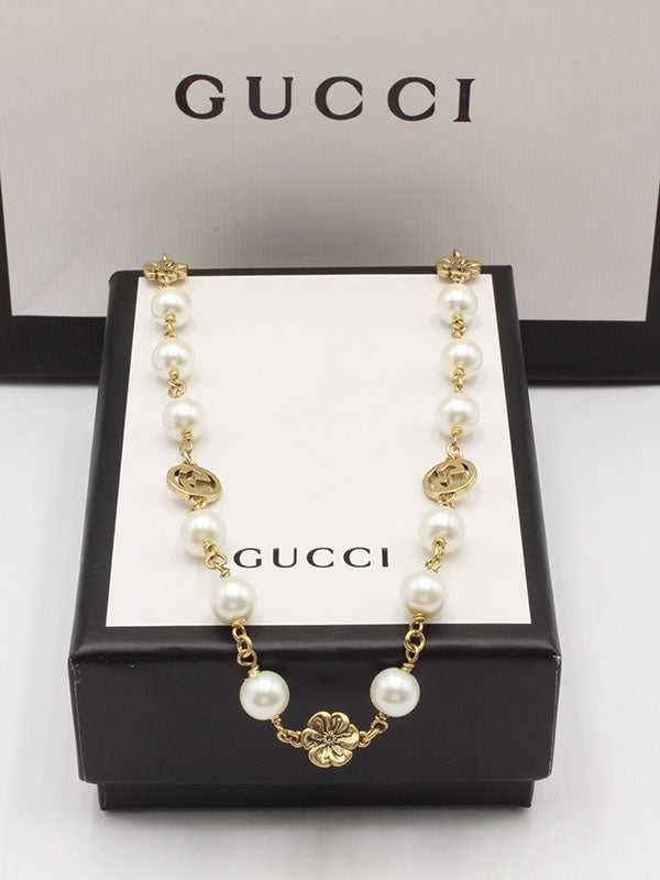 سلسال قوتشي بيرل لوقو برونز سلسال gucci برونزي