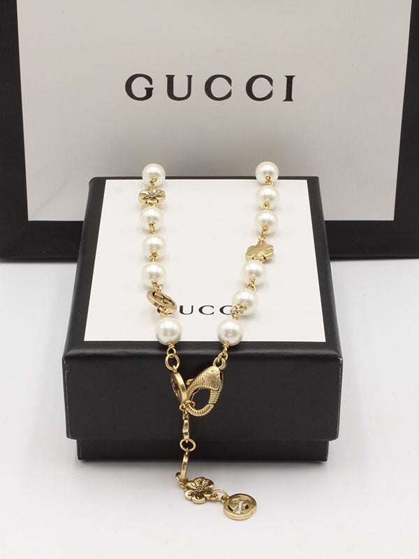 سلسال قوتشي بيرل لوقو برونز سلسال gucci