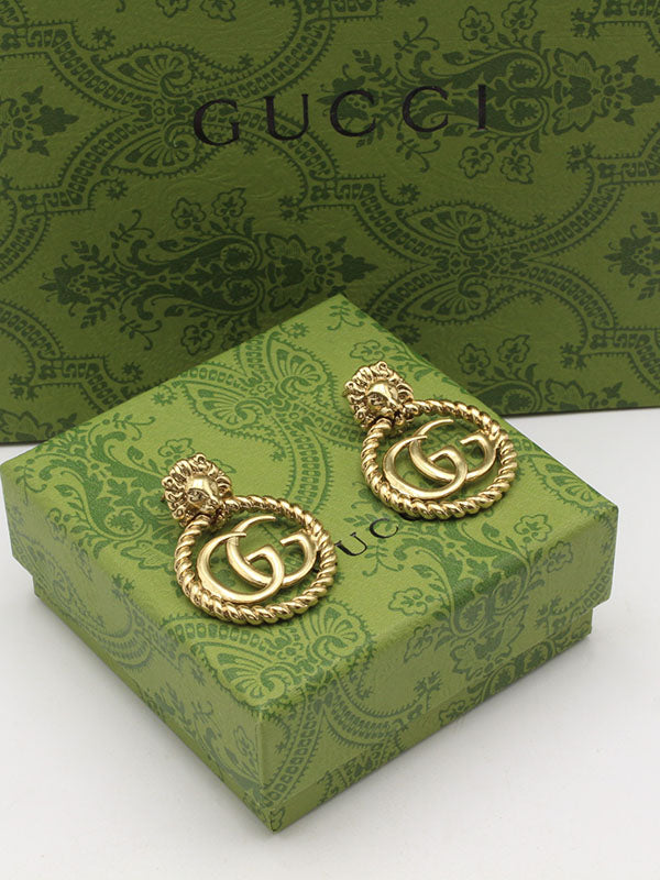 حلق قوتشي انتيك مدور كبير حلق gucci برونزي