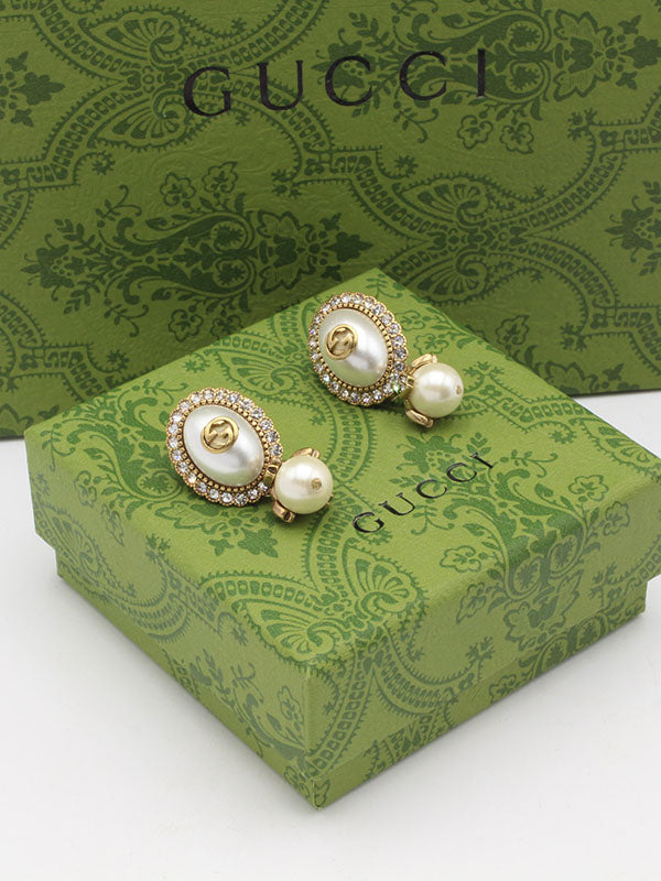 حلق قوتشي بيضاوي انتيك لوقو حلق gucci