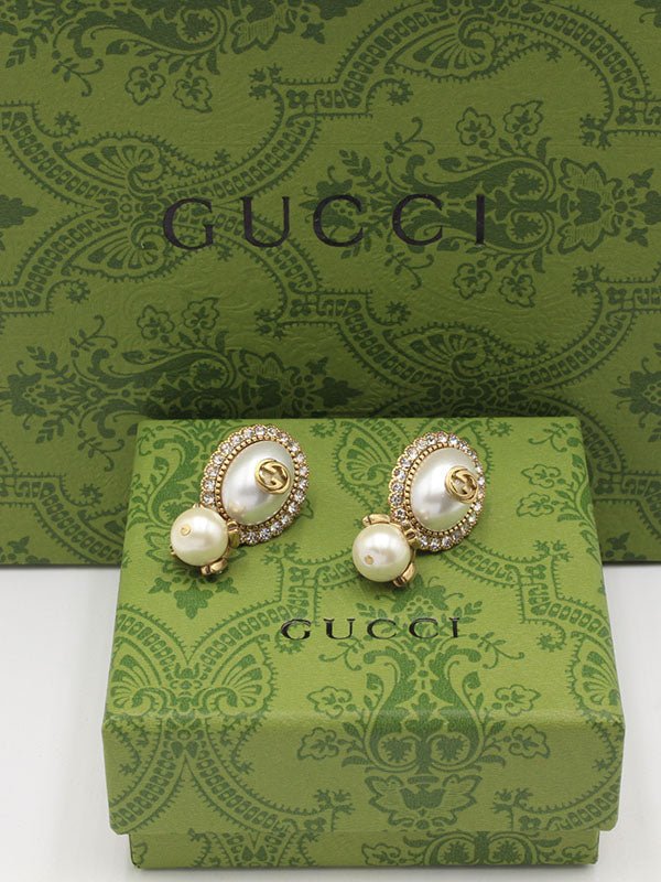 حلق قوتشي بيضاوي انتيك لوقو حلق gucci