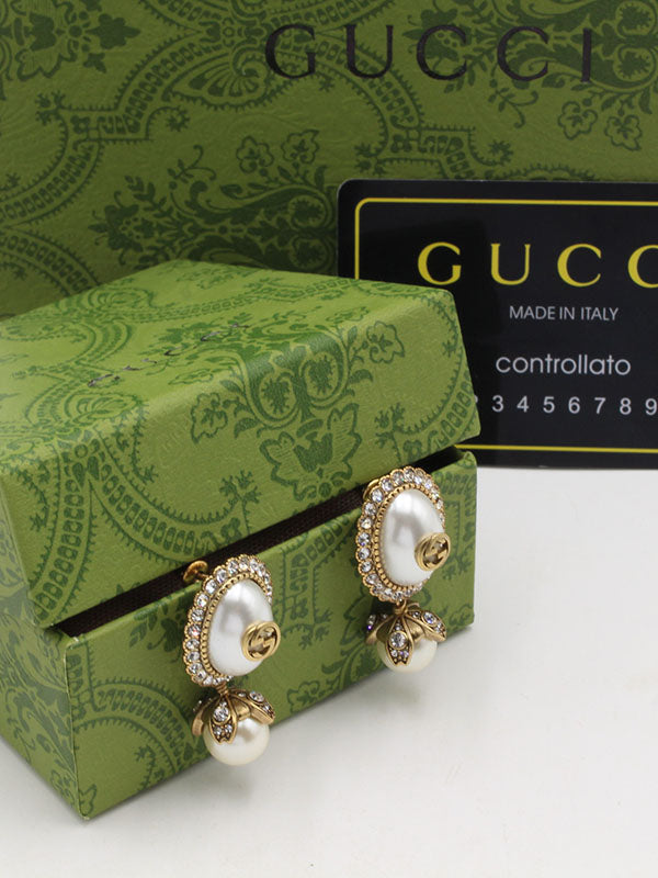 حلق قوتشي بيضاوي انتيك لوقو حلق gucci