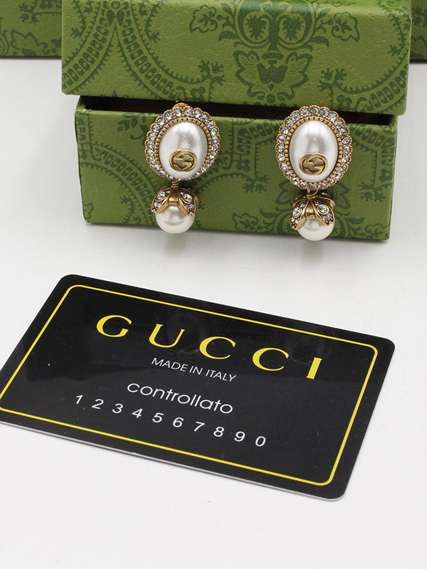 حلق قوتشي بيضاوي انتيك لوقو حلق gucci