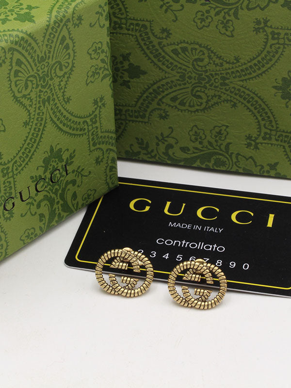 حلق قوتشي انتيك لوقو برونز حلق gucci ذهبي