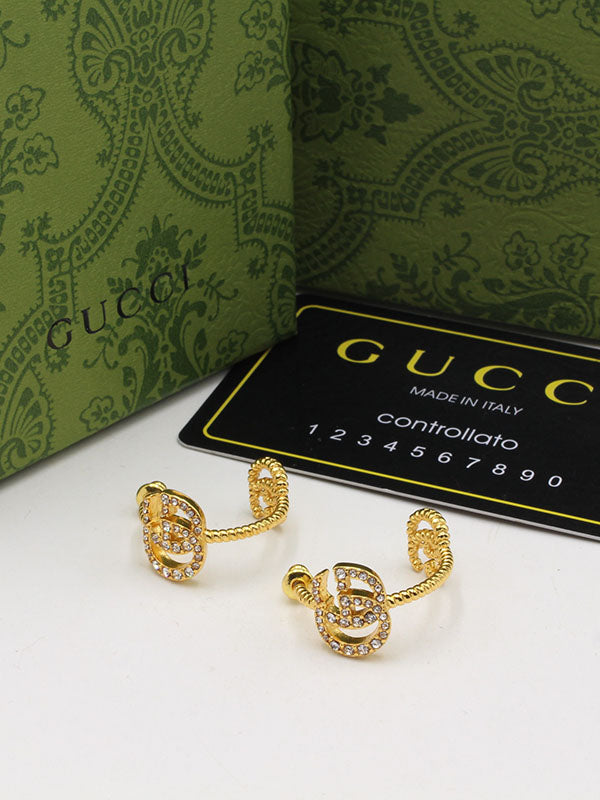 حلق قوتشي دبل لوقو حلق gucci ذهبي