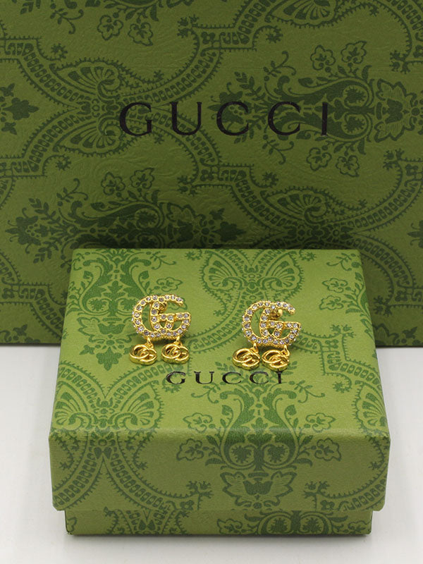 حلق قوتشي تو بندنتس لوقو حلق gucci ذهبي