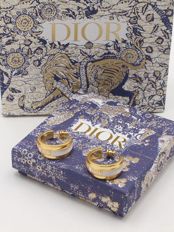 حلق ديور ابيض بذهبي مدور لوقو حلق dior ذهبي