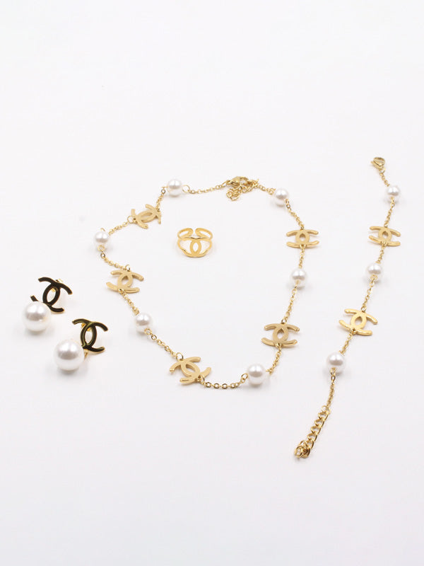 طقم شانيل لولو 4 قطع اطقم chanel ذهبي