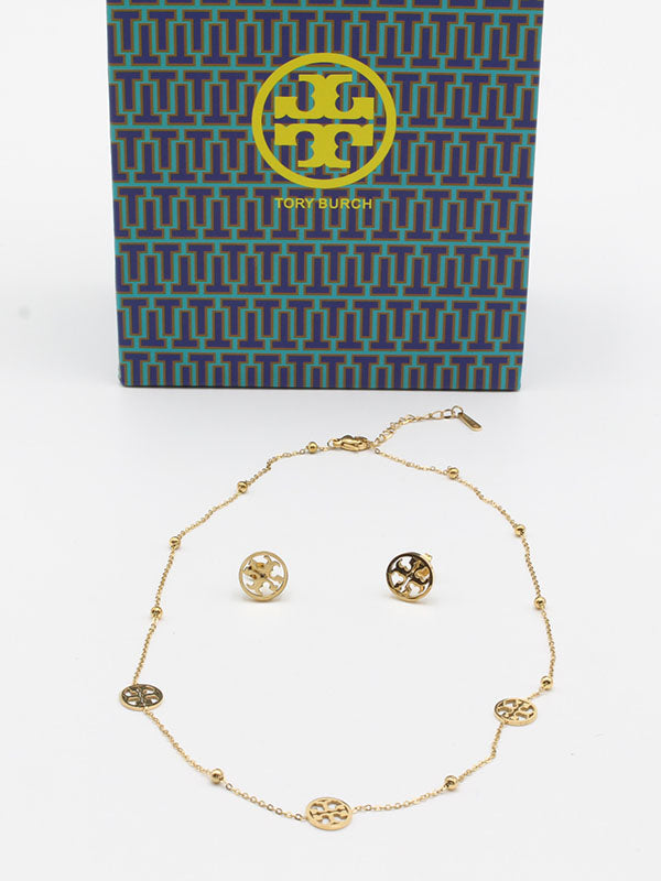 طقم توري بورش ناعم اطقم tory burch ذهبي