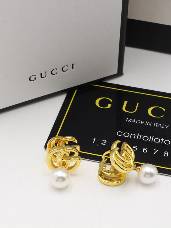 حلق قوتشي دبل لوقو بيرل حلق gucci ذهبي