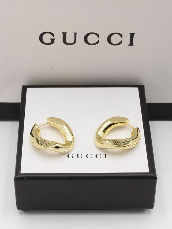 حلق قوتشي كبس كبير لوقو حلق gucci ذهبي