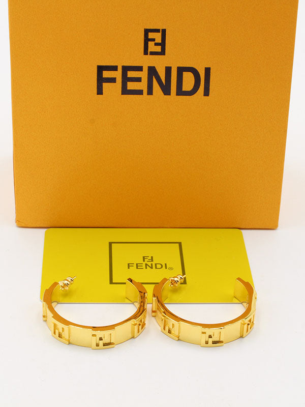 حلق فندي ميتال ستامب لوقو حلق fendi ذهبي