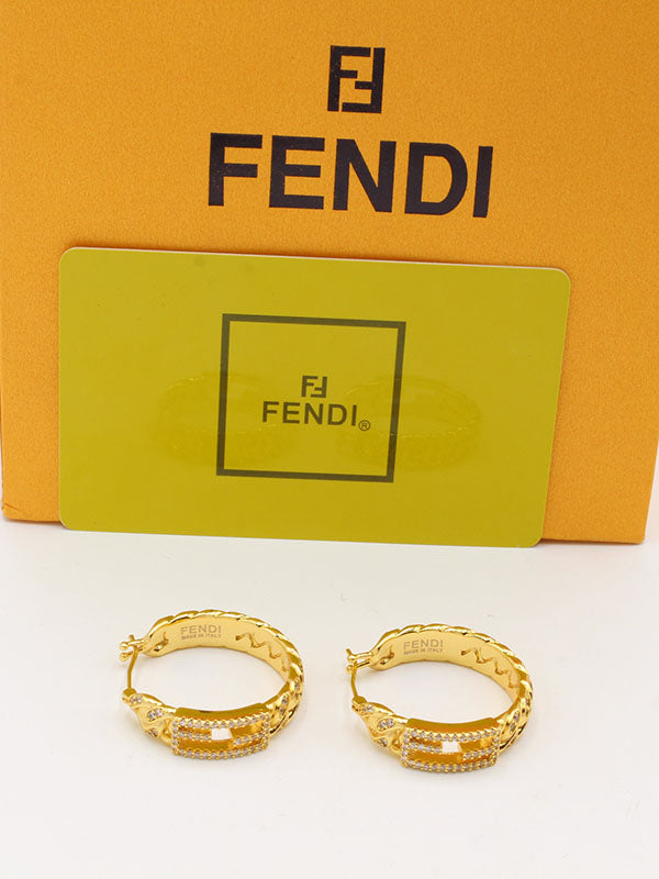 حلق فندي ميتال وسط زركون لوقو حلق fendi ذهبي
