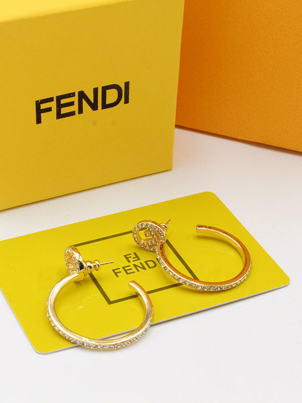 حلق فندي زركون وسط لوقو ذهبي حلق fendi ذهبي