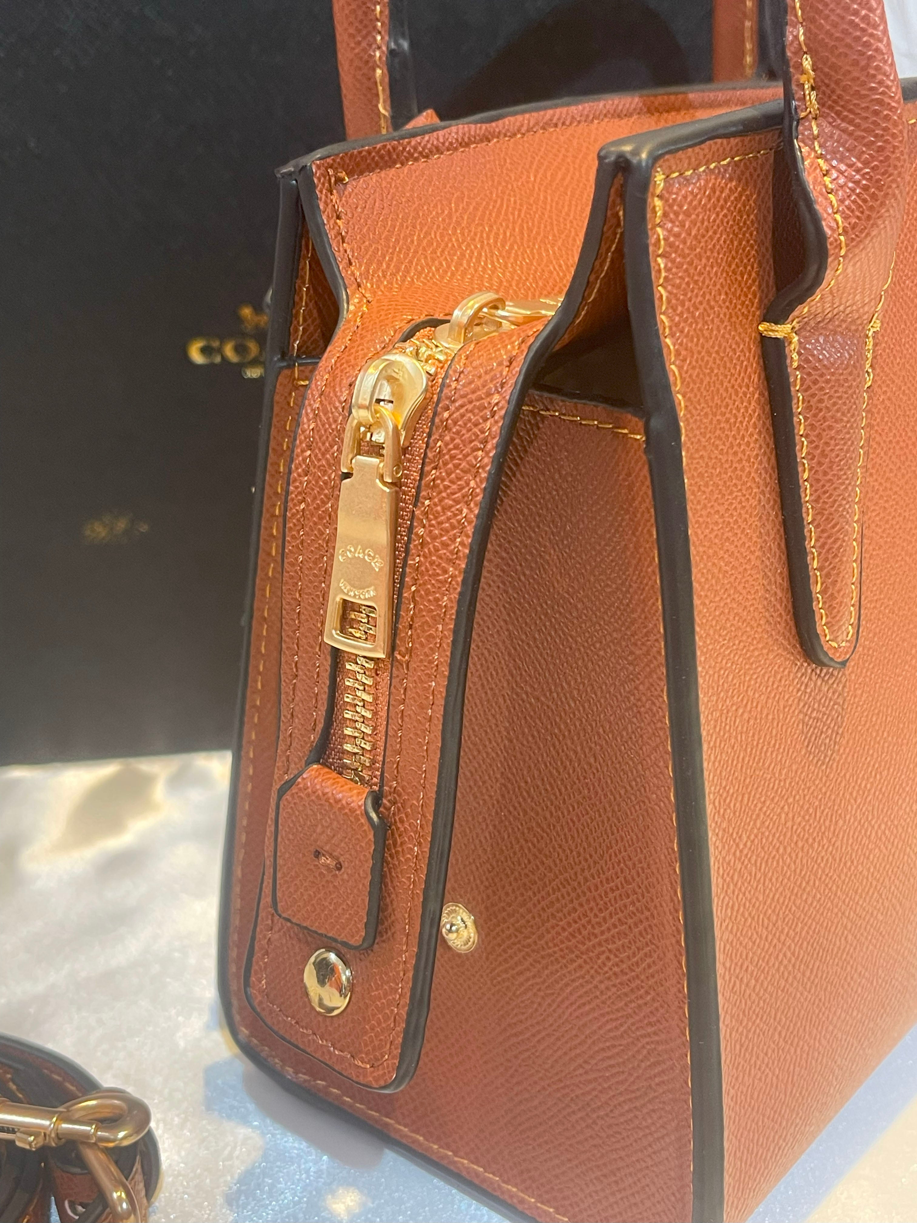 شنطة كوتش رقيلور متوسطه الحجم شنط وحقائب coach bags