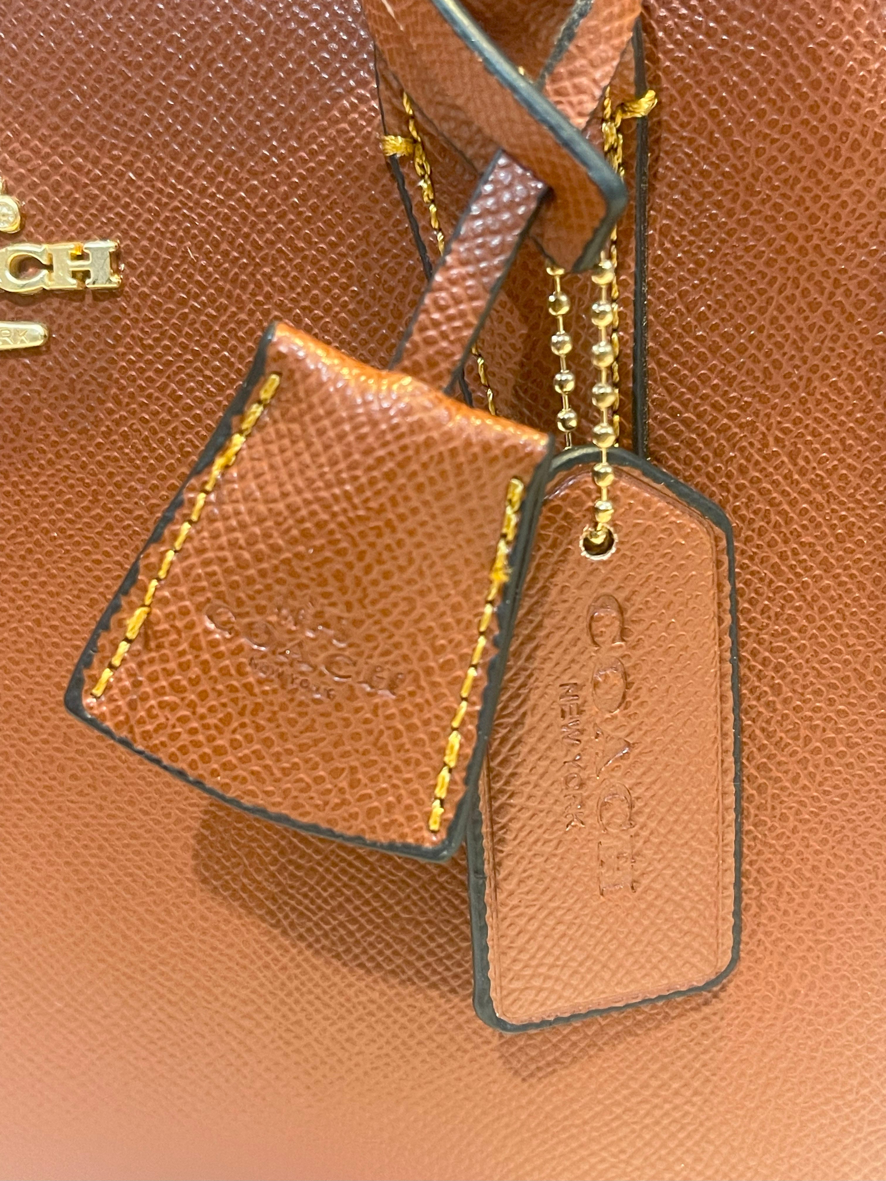 شنطة كوتش رقيلور متوسطه الحجم شنط وحقائب coach bags