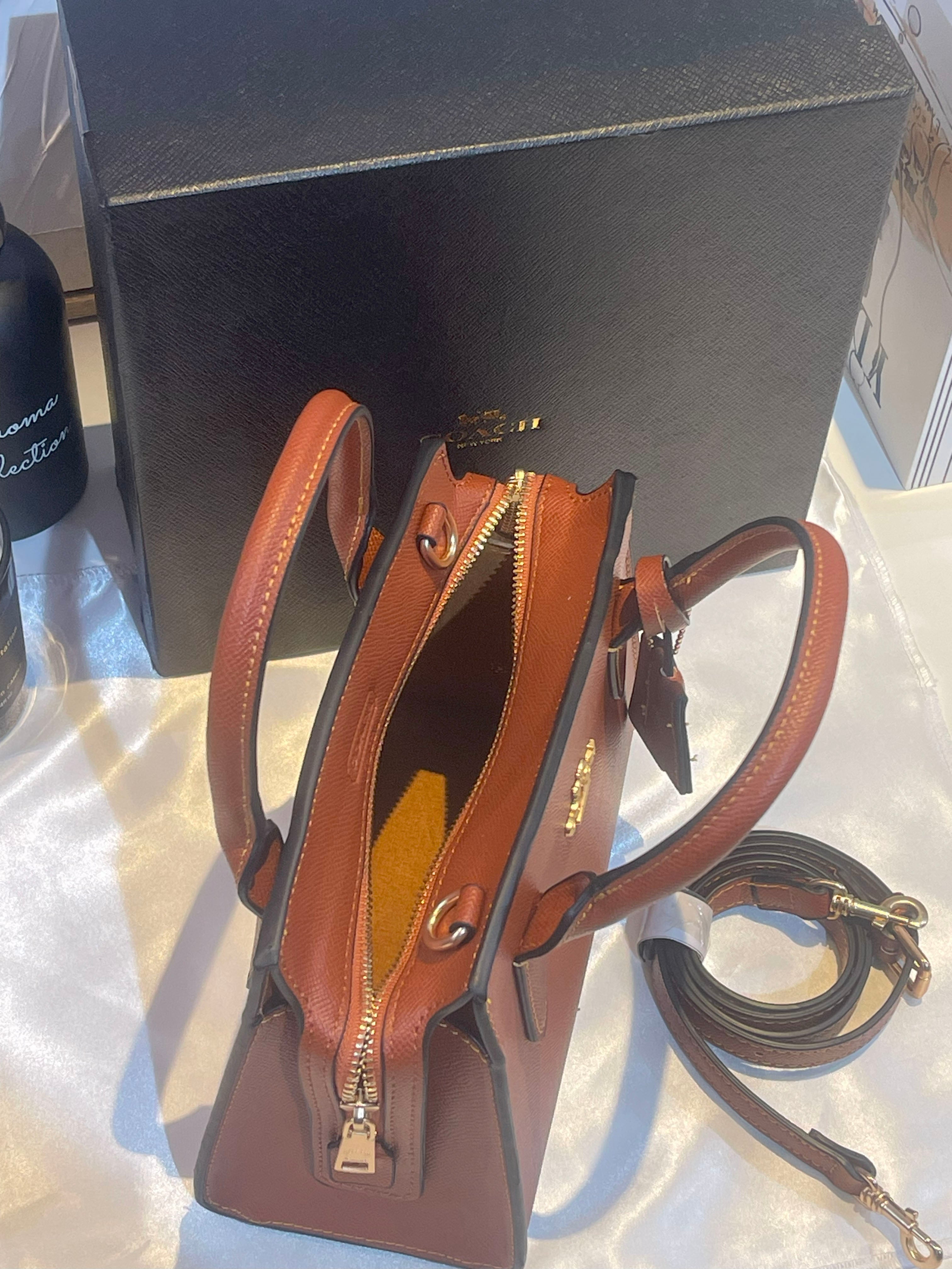 شنطة كوتش رقيلور متوسطه الحجم شنط وحقائب coach bags