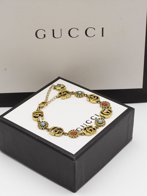 اسواره قوتشي احجار ملونه شعار اسواره gucci