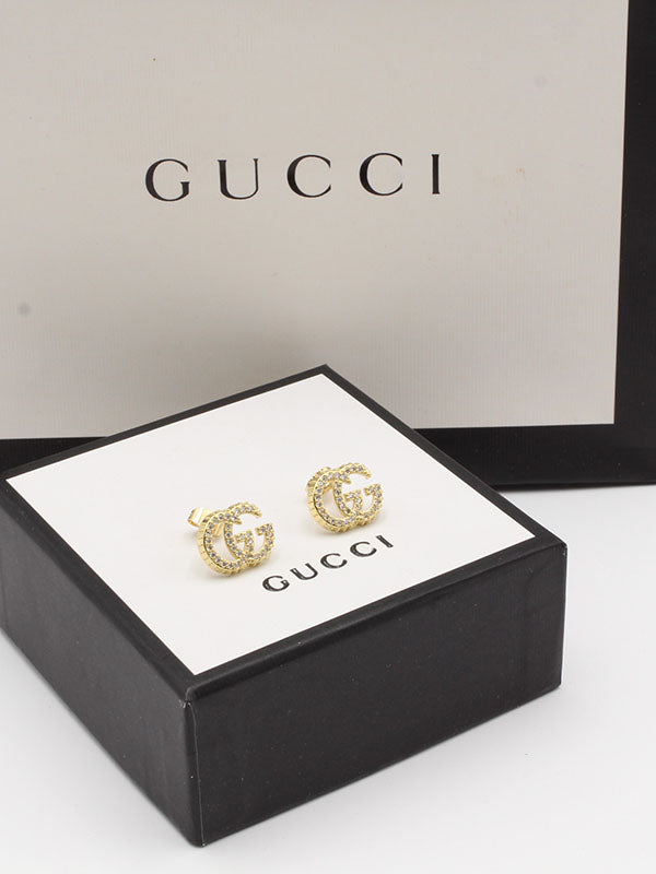 حلق قوتشي زركون ناعم حلق gucci ذهبي