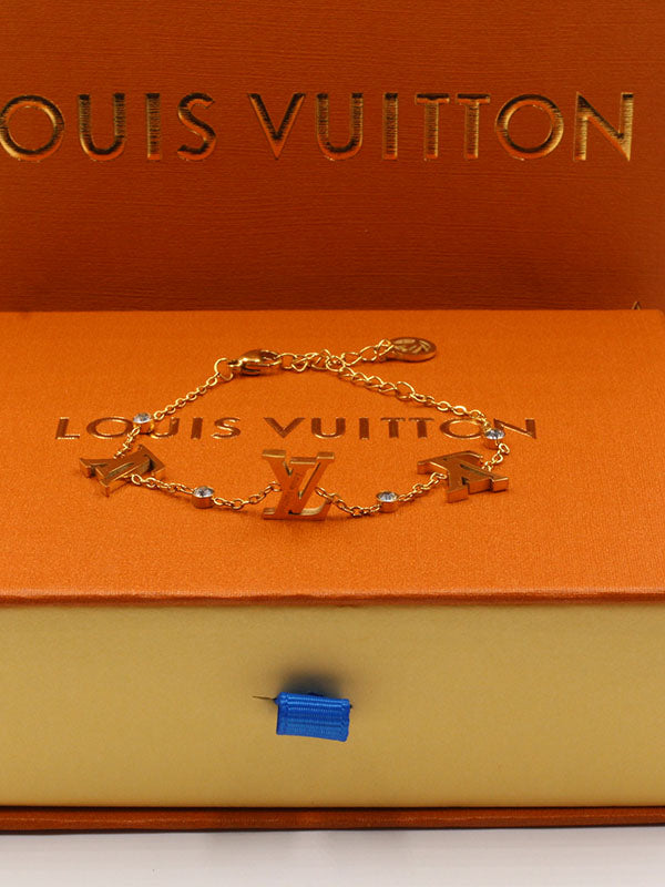 اسواره لويس فيتون بنتدنت لوقو ذهبي اسواره louis vuitton