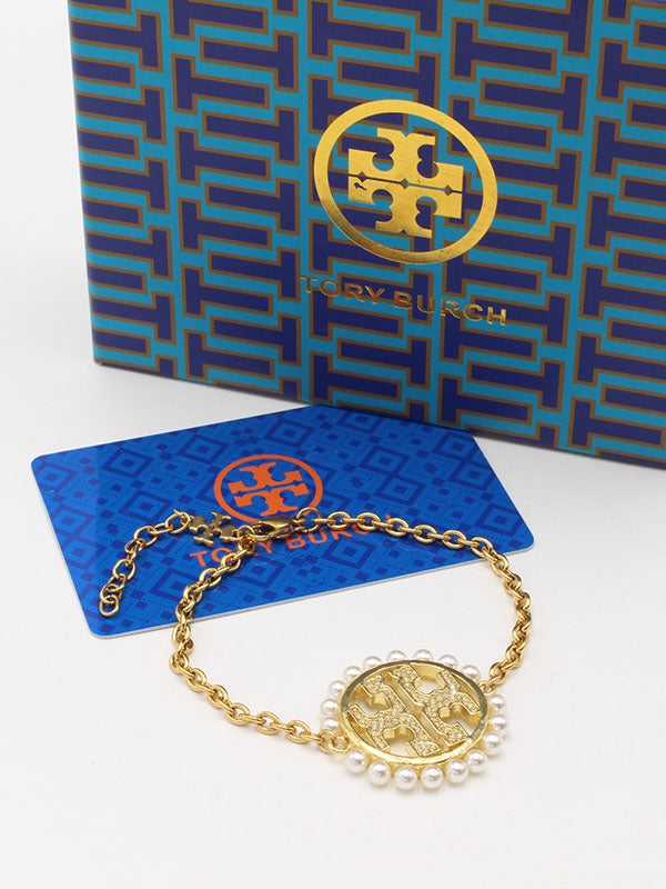 اسواره توري بورش لولو كبيرة اسواره tory burch ذهبي