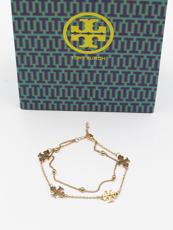 اسواره توري بورش دبل شاين قولد اسواره tory burch ذهبي
