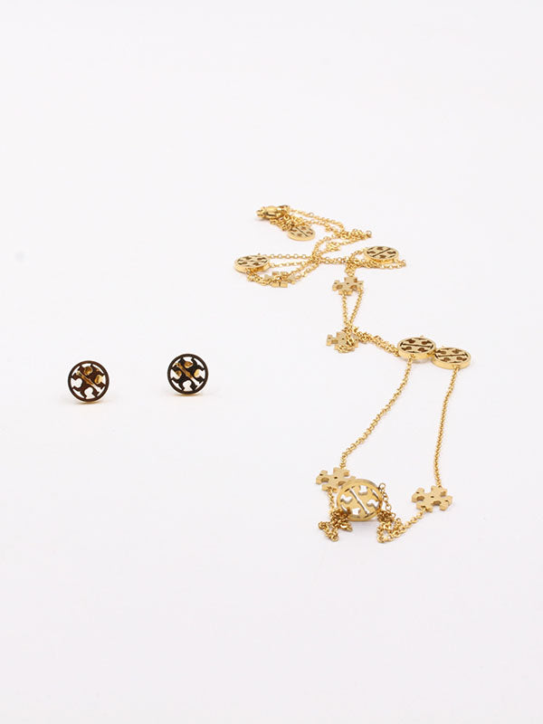 طقم توري بورش طويل ذهبي اطقم tory burch