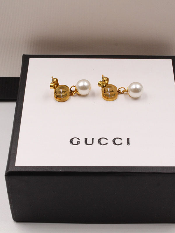 حلق قوتشي لولو ميتال ذهبي حلق gucci